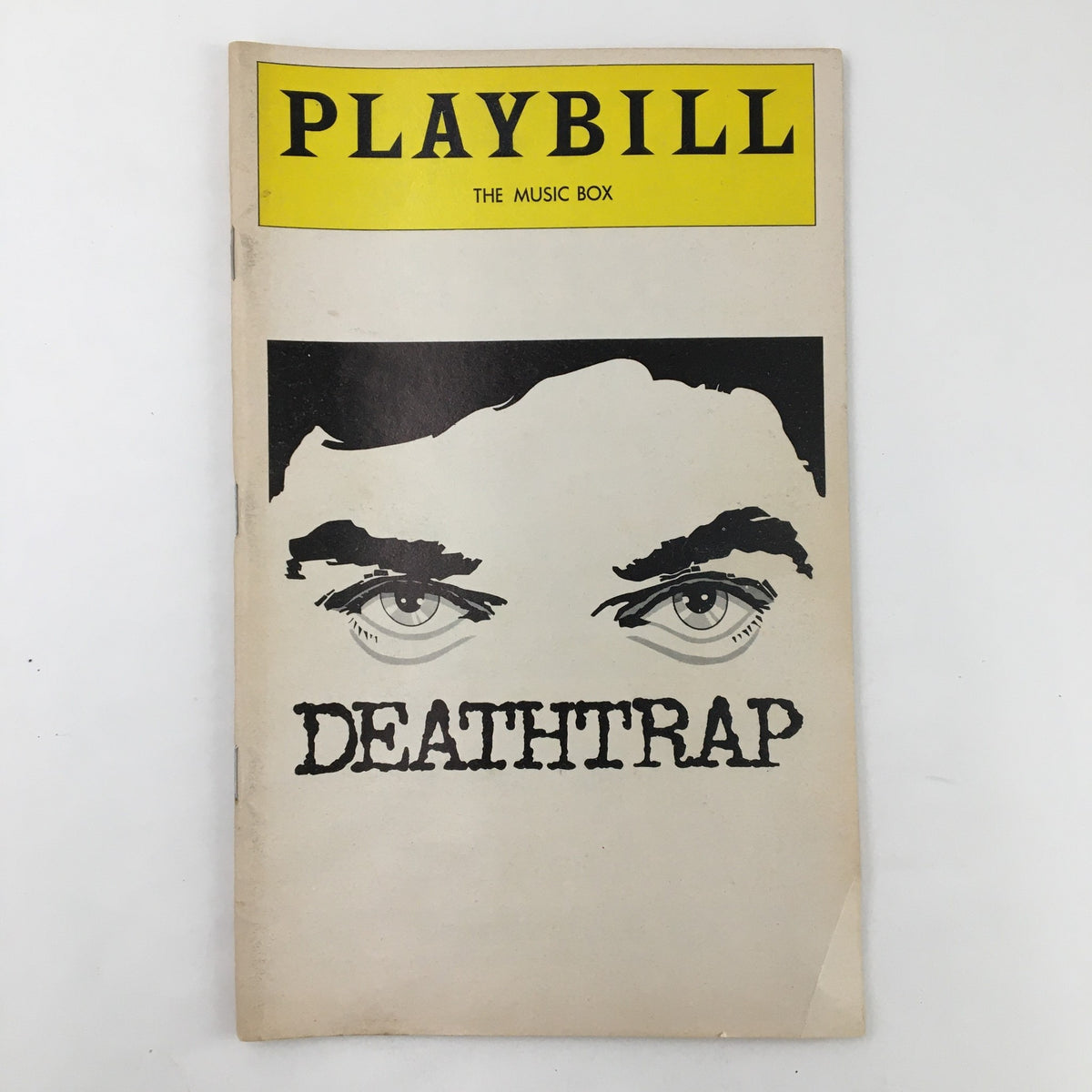 1978 Playbill from The Music Box, featuring the cover of Ira Levin's Deathtrap, showcasing striking graphic of eyes and the title 'DEATHTRAP'