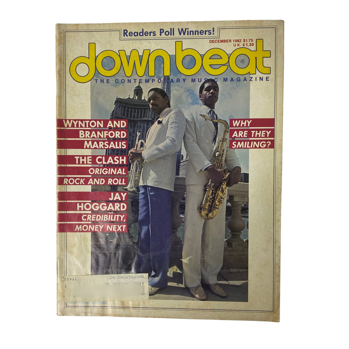 Cover of Down Beat Magazine December 1982 Vol 49 No. 12 featuring Wynton and Branford Marsalis, showcasing them in formal attire with saxophones, highlighting the magazine's theme of contemporary music.
