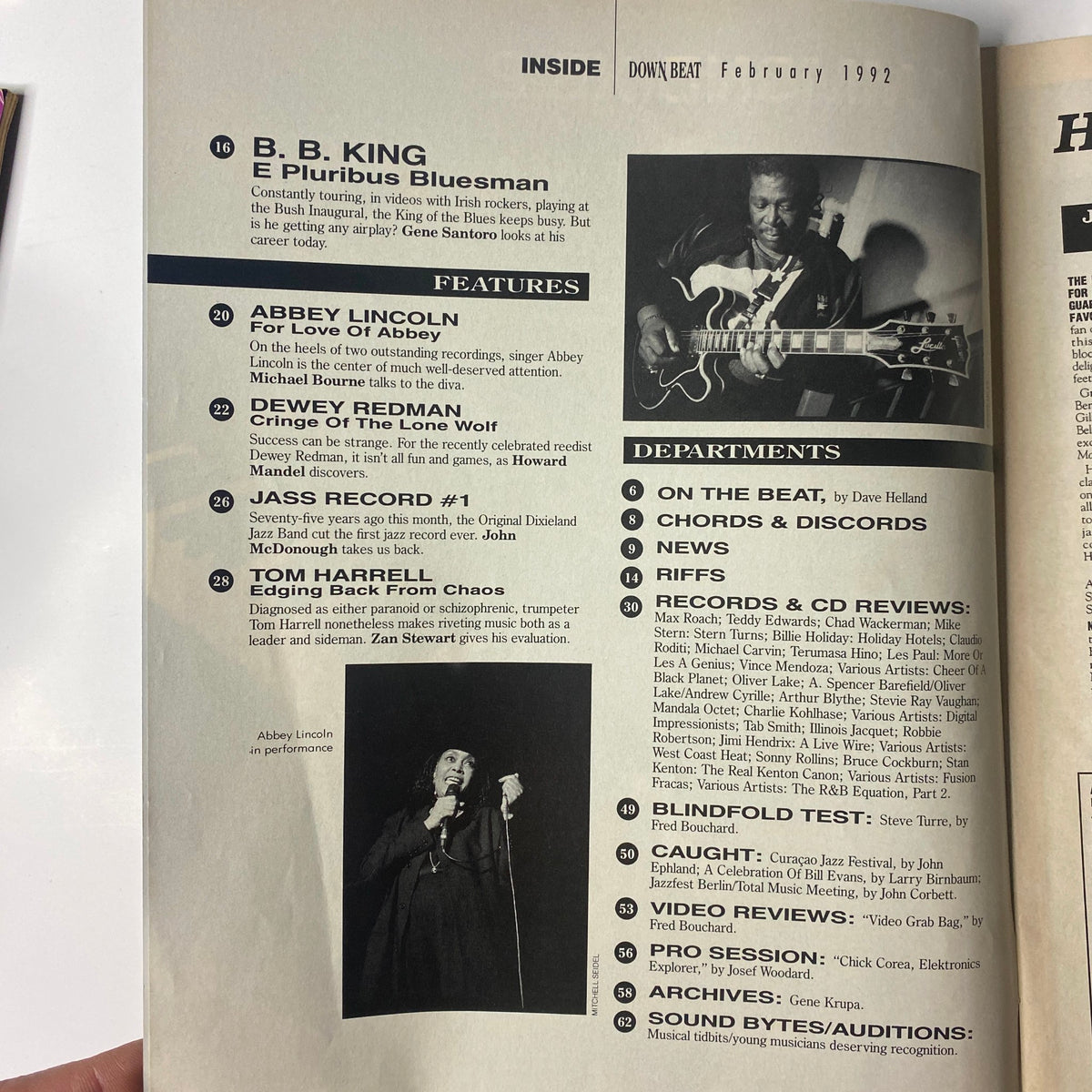 Inside page from Down Beat Magazine February 1992 featuring B.B. King on the cover with the article title 'E Pluribus Bluesman'. The page includes features on Abbey Lincoln, Dewey Redman, Jass Record #1, and Tom Harrell, along with sections on departments and music reviews.