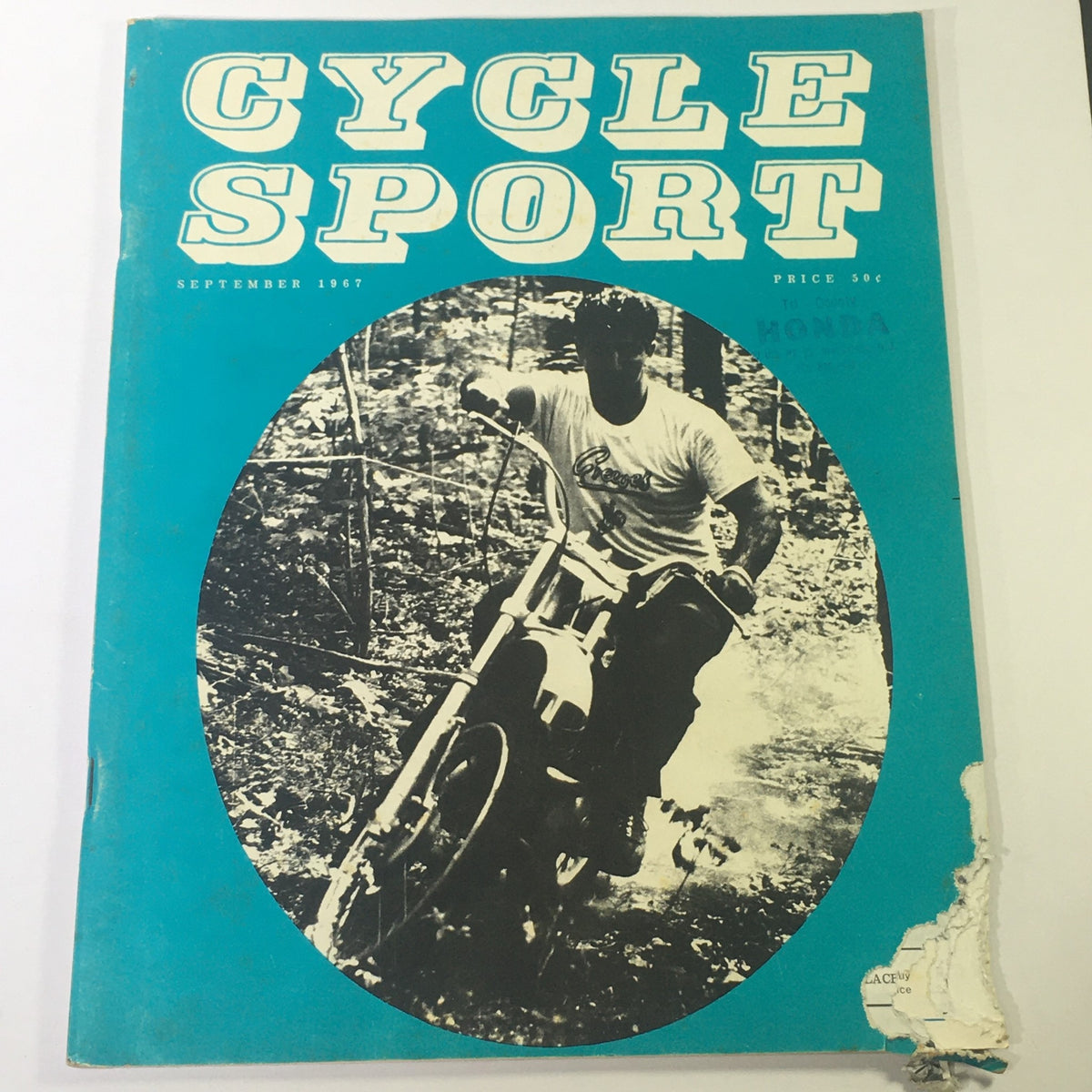 Cover of VTG Cycle Sport Magazine September 1967 featuring Honda 450 DOHC Sport, showcasing a motorcyclist riding through a forested area.
