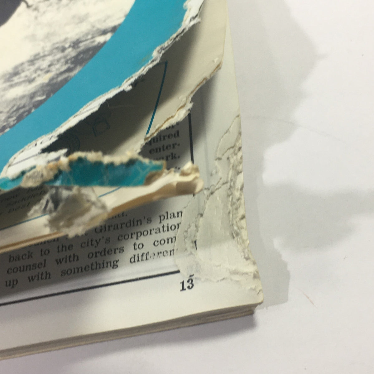 Close-up of the edge of the September 1967 Cycle Sport Magazine, showcasing minor wear and tear, highlighting its vintage condition.