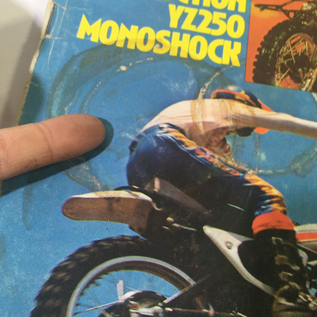 Close-up of the VTG Motor Cycle World Magazine September 1974 cover highlighting the Yamaha YZ250 Monoshock with a motorcyclist in action.
