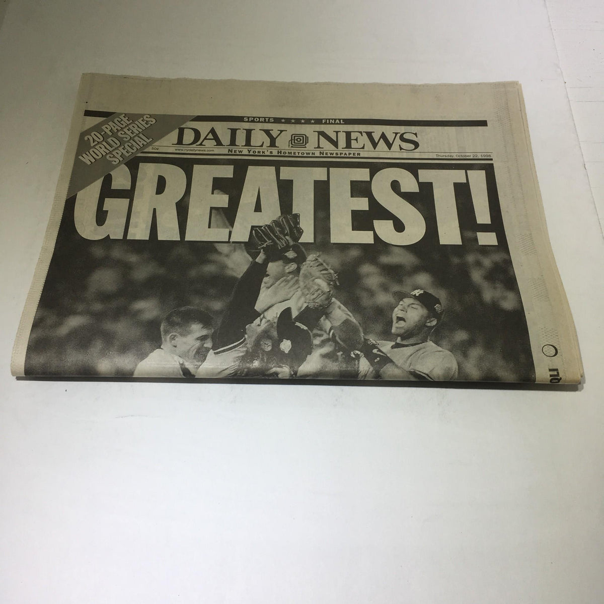 New York Daily News headline 'GREATEST!' from October 22, 1998, featuring New York Yankees victory celebration after the World Series.