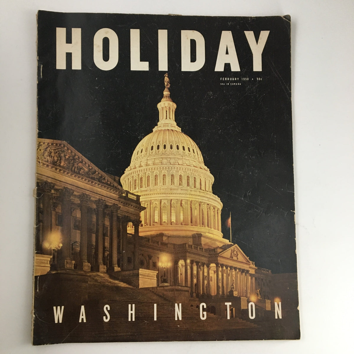 Holiday Magazine February 1950 cover featuring the Capitol Building in Washington, USA, highlighting historical and cultural themes.