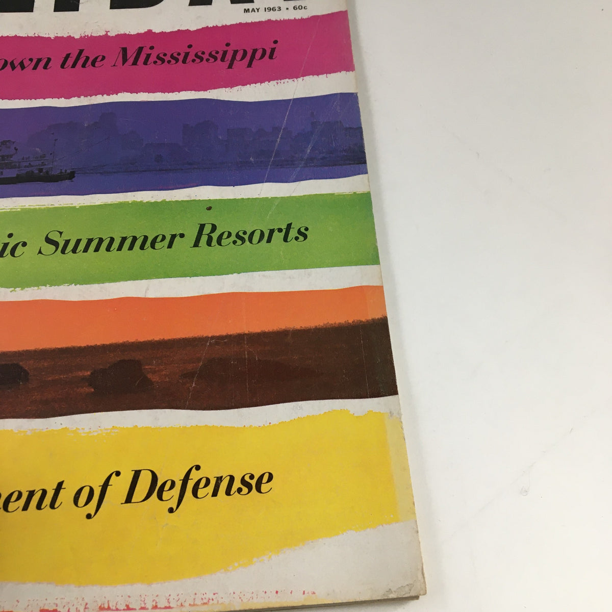Detailed view of the cover text from Holiday Magazine May 1963 with highlights on the features including 'Journey Down the Mississippi' and 'Department of Defense'.