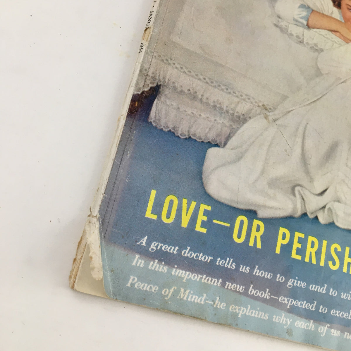 Close-up of the Woman's Home Companion Magazine January 1956 showing the text 'Love - Or Perish', highlighting its vintage appeal and insightful articles.