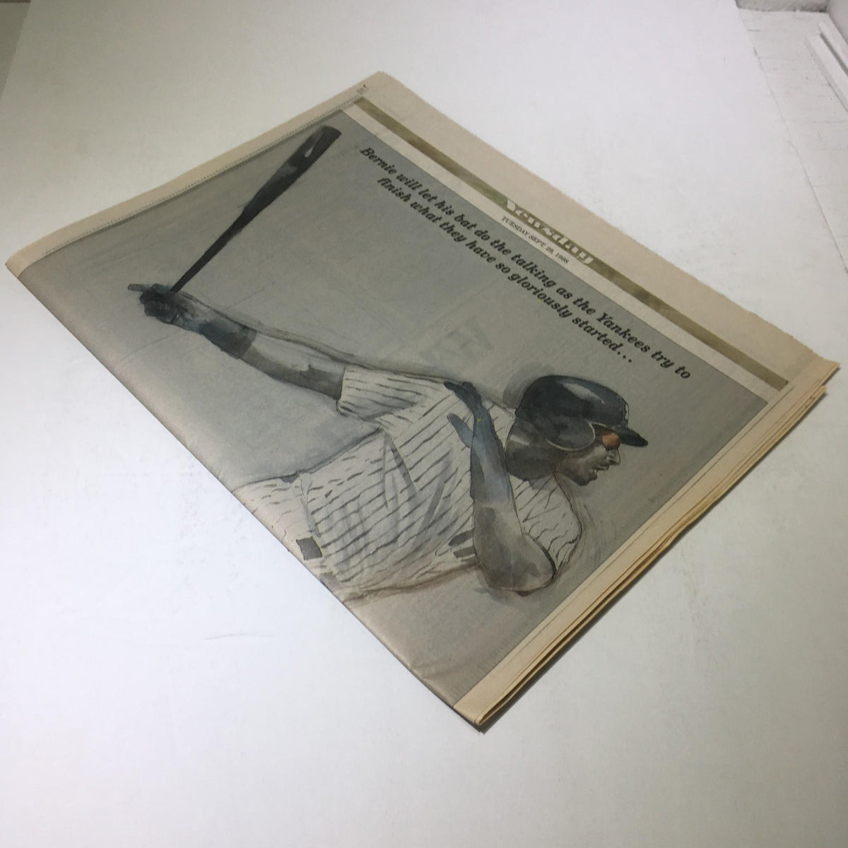 Side view of the Newsday article titled 'The Sky's the Limit,' showing a player preparing to swing the bat, emphasizing the New York Yankees' pursuit of victory in the baseball playoffs.