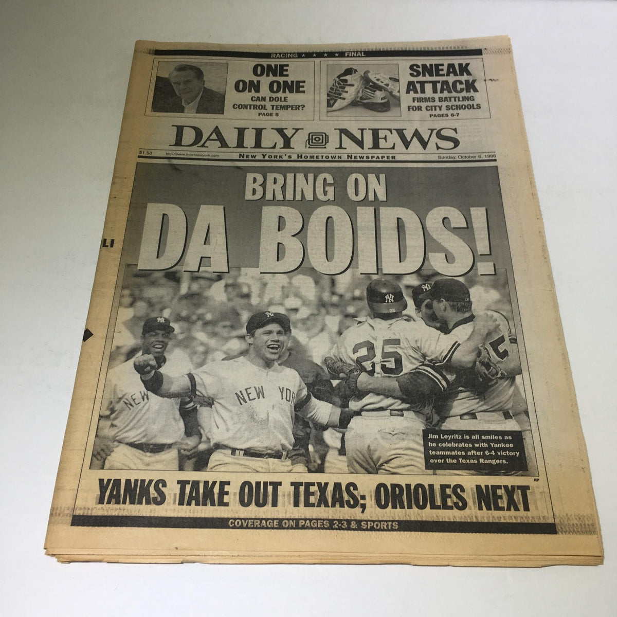 Vintage NY Daily News headline from October 6, 1996, titled "Bring On Da Boids! Yanks Take Out Texas; Orioles Next." The newspaper features images of New York Yankees players celebrating a playoff victory, capturing a significant moment in sports history.