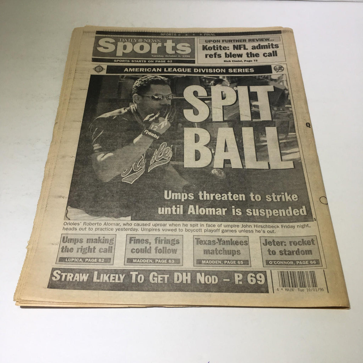 New York Daily News sports section from October 1, 1996, with the headline 'SPIT BALL', highlighting the umpires' threat to strike and featuring a player from the game.