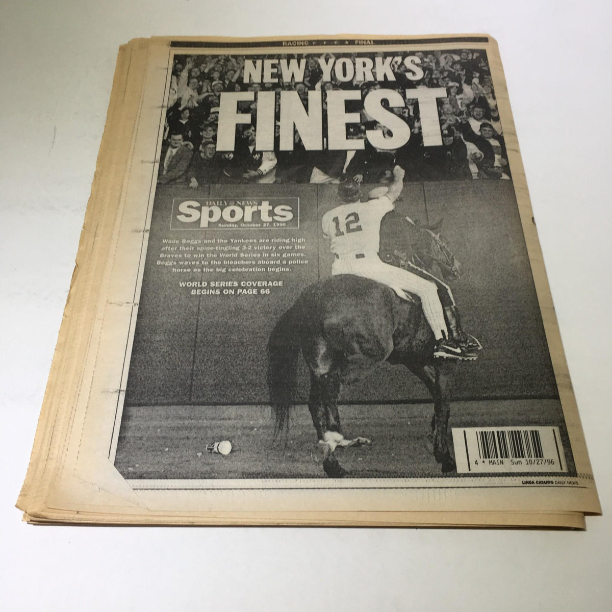 New York Daily News: Oct 27, 1996 cover titled 'NEW YORK'S FINEST' highlighting the celebration after the Yankees' World Series victory, with a police officer on horseback.