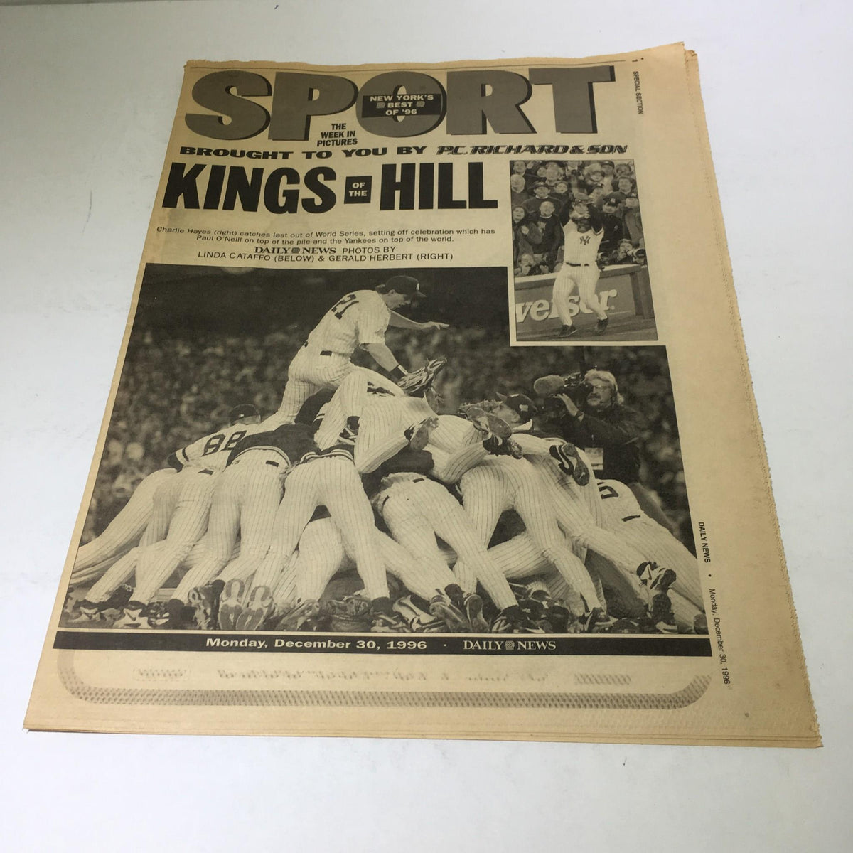 NY Daily News cover from December 30, 1996, featuring the title 'Kings Of The Hill' with a dramatic sports image showcasing a celebration, ideal for vintage magazine collectors.