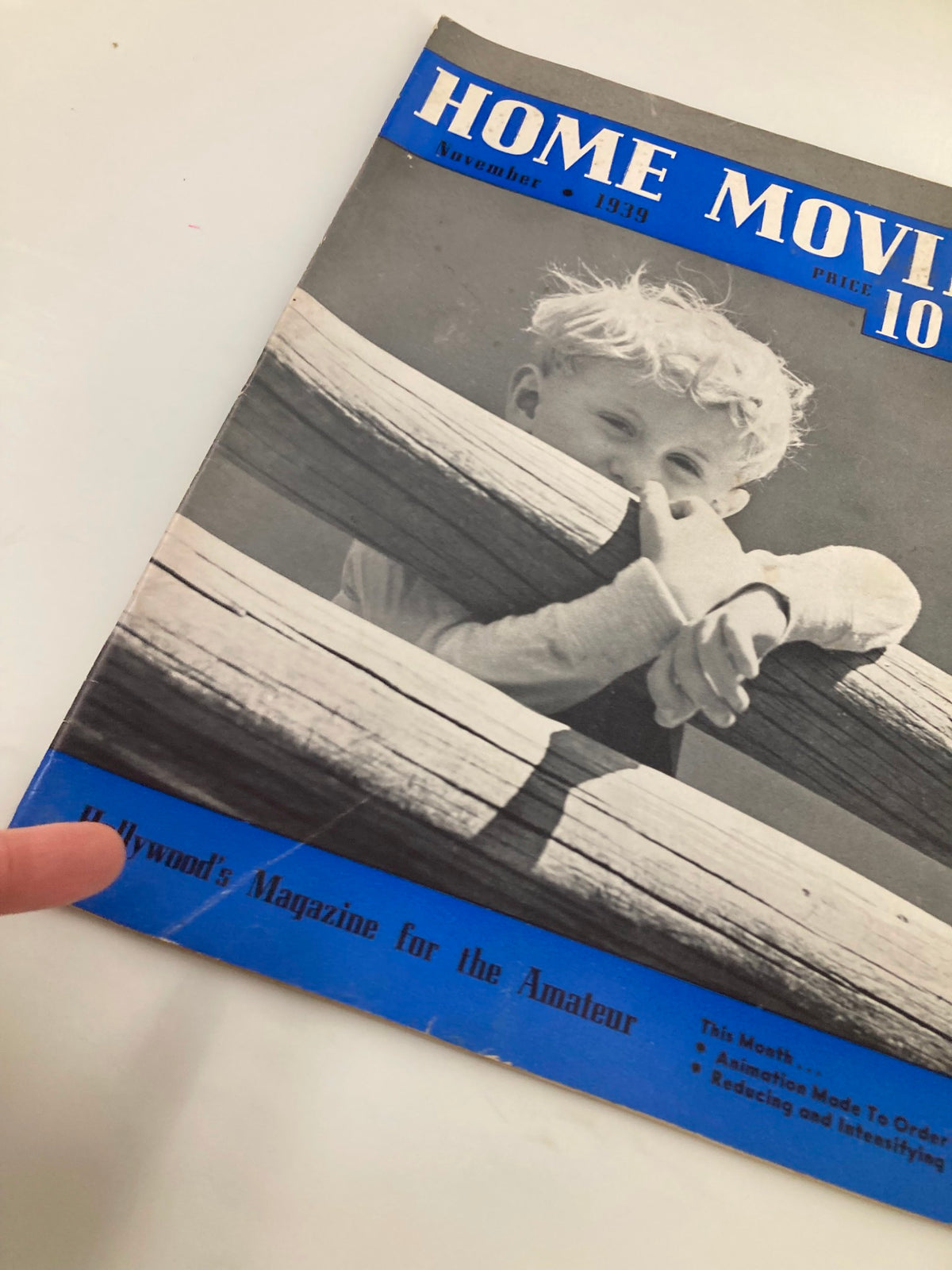 Detailed view of VTG Home Movies Magazine November 1939 cover highlighting the tagline 'Hollywood's Magazine for the Amateur' with a child and wooden fence.