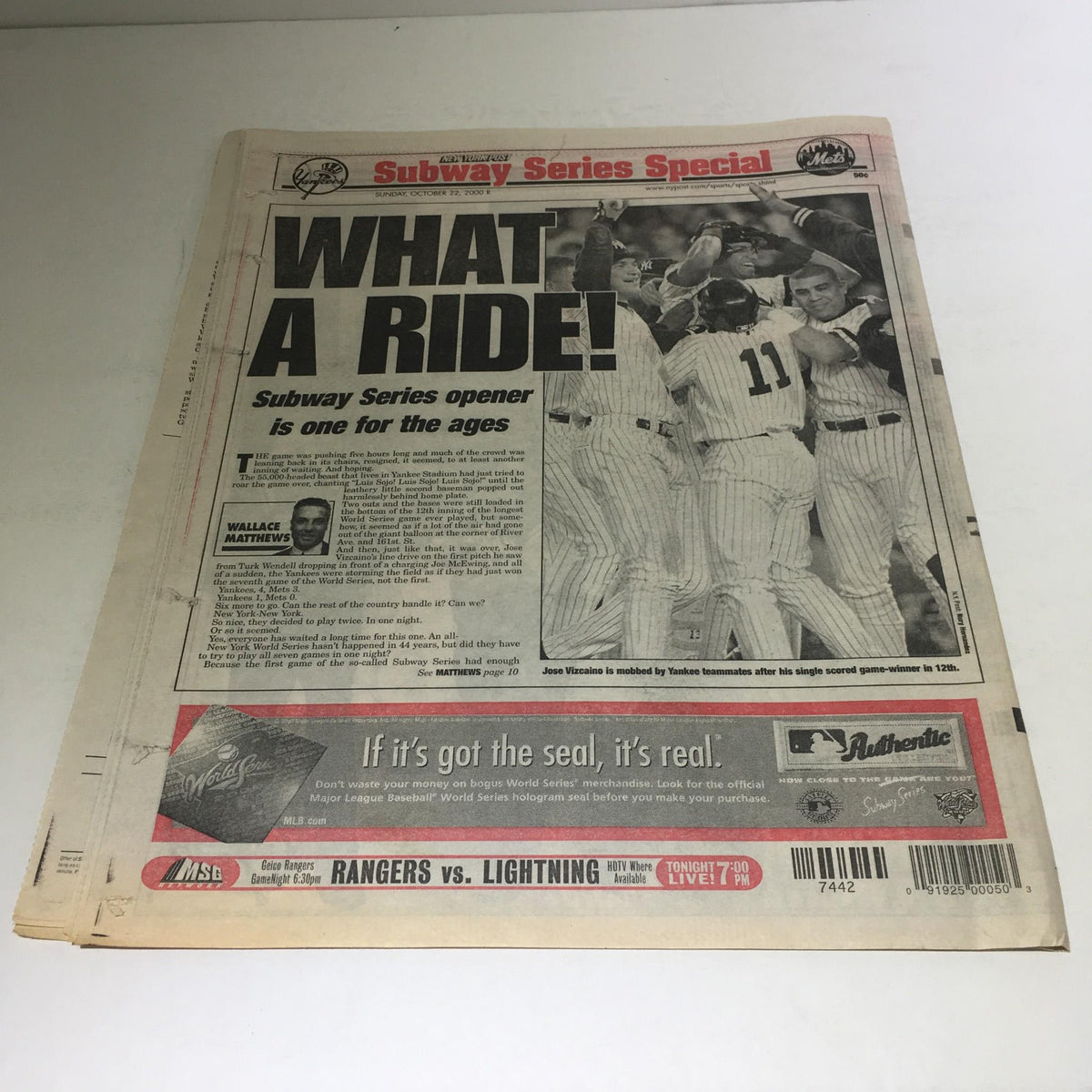 The front page of the New York Post Subway Series Special, highlighting the excitement of the subway series opener with the headline 'WHAT A RIDE!' and featuring images of celebrating players.