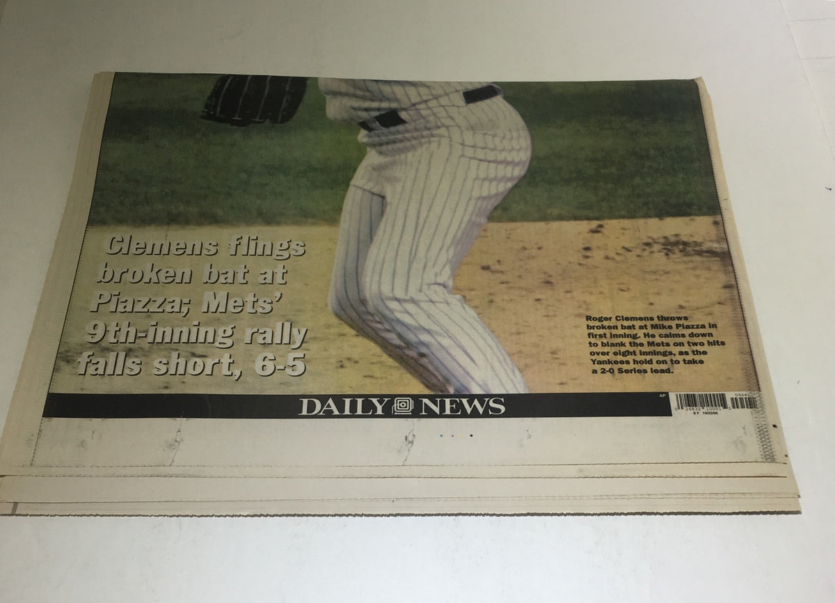 Close-up view from the NY Daily News, October 23, 2000, titled 'Roger Goes Batty,' focusing on the action involving Roger Clemens and Mike Piazza in a tense moment.