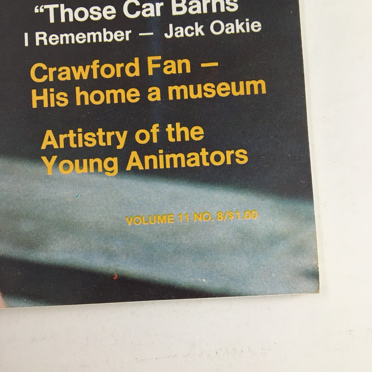 Back cover of Hollywood Studio Magazine August 1977 highlighting articles including 'Those Car Barns' and features on Joan Crawford's fan museum, showcasing vintage magazine content.
