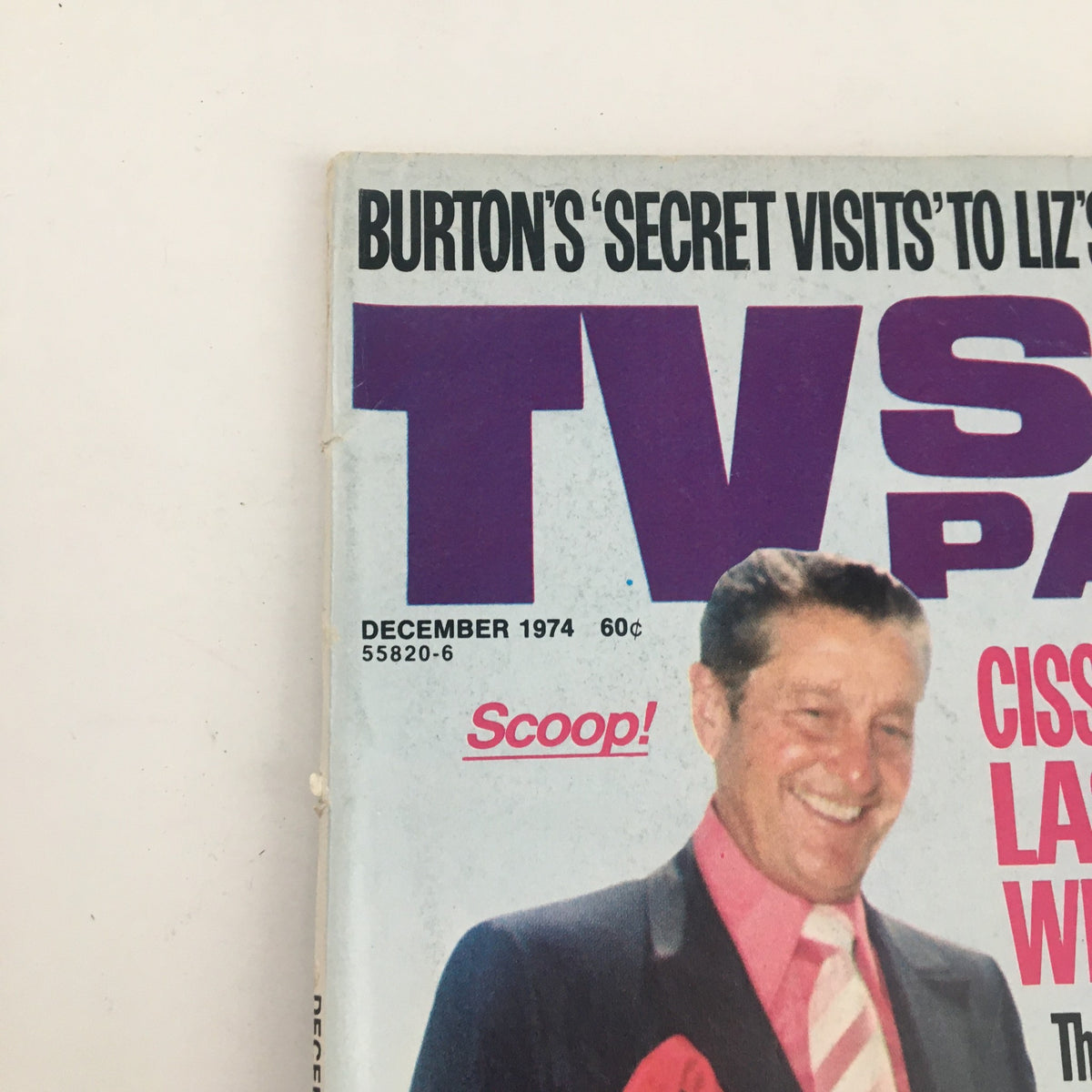 Cover of TV Star Parade Magazine December 1974 featuring a smiling man in a suit and bold headlines about Hollywood stars.
