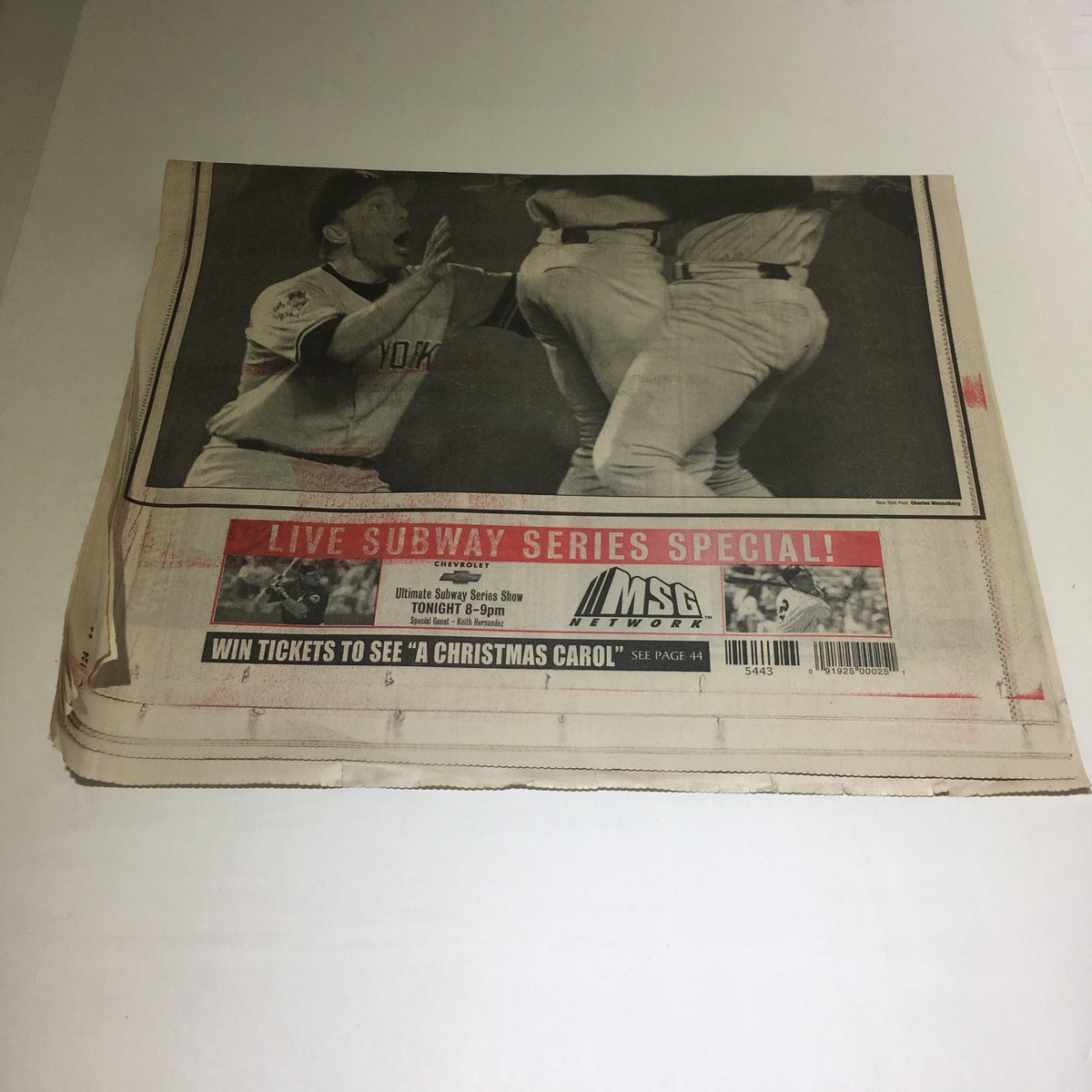 Back cover of the vintage New York Post newspaper featuring promotional content for MSG and a reminder for a live Subway Series special, highlighting the excitement of the event.