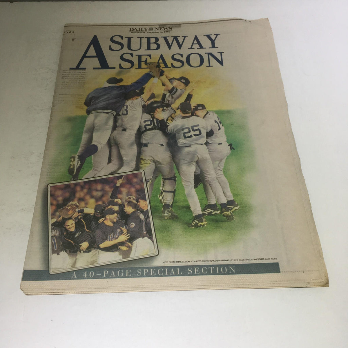 NY Daily News: Nov 1 2000 A Subway Season front cover featuring a jubilant celebration of a baseball team, showcasing the essence of a memorable sports season.