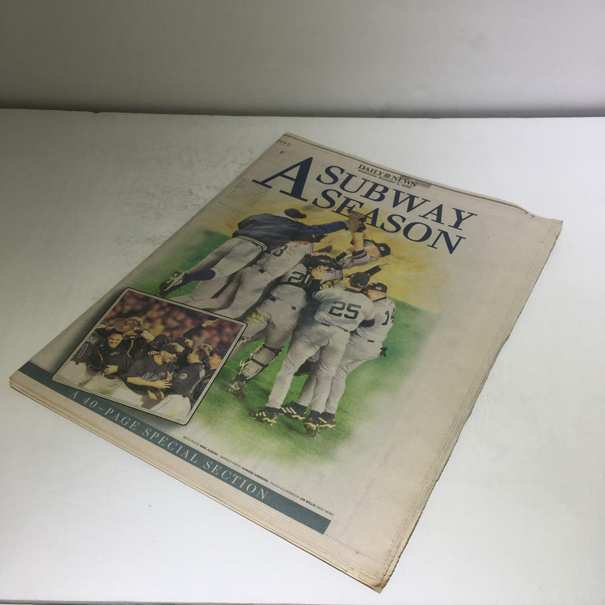 NY Daily News: Nov 1 2000 A Subway Season, Excellent - Cover of a special 40-page section celebrating the Yankees' Subway Series victory, featuring a vibrant illustration of celebrating players.