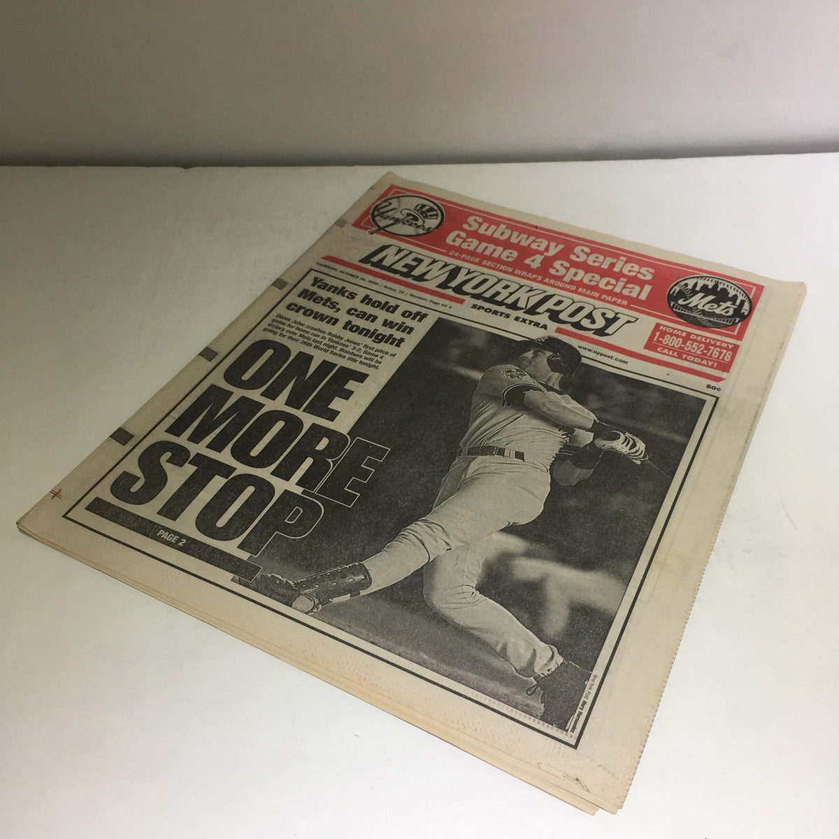 New York Post newspaper titled 'NEW YORK POST: ONE MORE STOP,' highlighting the Yankees' game against the Mets in the Subway Series.