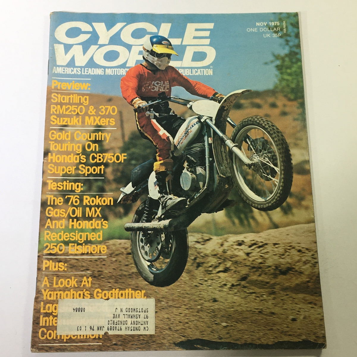 Cycle World Magazine cover from November 1975 featuring the '76 Rokon MX and Honda 250 Elsinore test, showcasing motocross action with a rider performing on a dirt track.