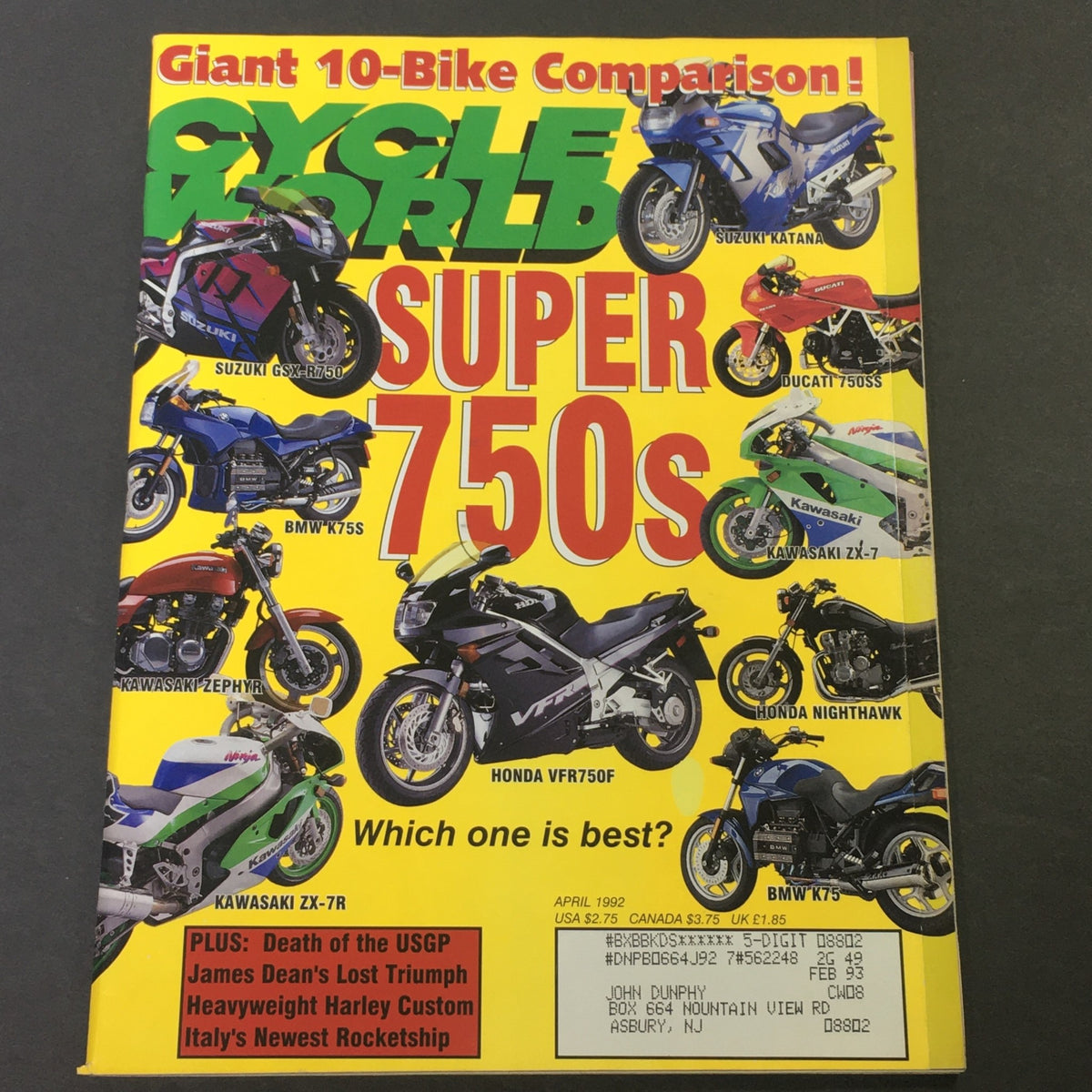 Cycle World Magazine April 1992 featuring a vibrant cover showcasing a comparison of super 750cc motorcycles including models like Suzuki GSX-R750, Kawasaki ZX-7R, and Honda VFR750F. The magazine includes articles on topics such as James Dean's Lost Triumph and motorcycle heritage.