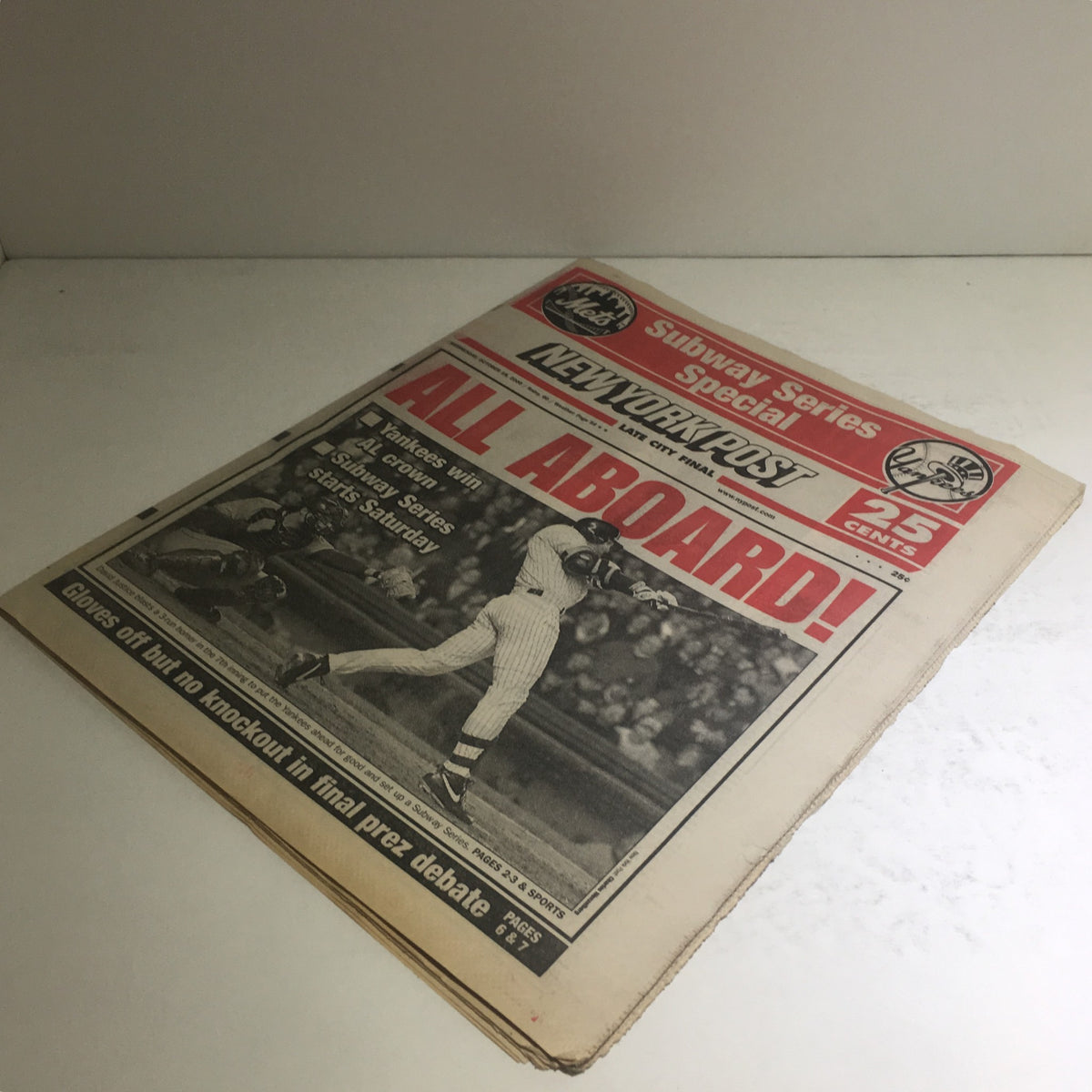 Another view of the front cover of the New York Post from October 18, 2000, prominently displaying 'ALL ABOARD!' headline with sports coverage.