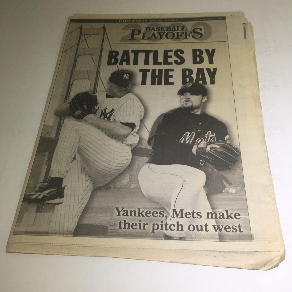 NY Daily News header featuring 'Battles By The Bay' with Yankees and Mets players, showcasing the October 3, 2000 edition.