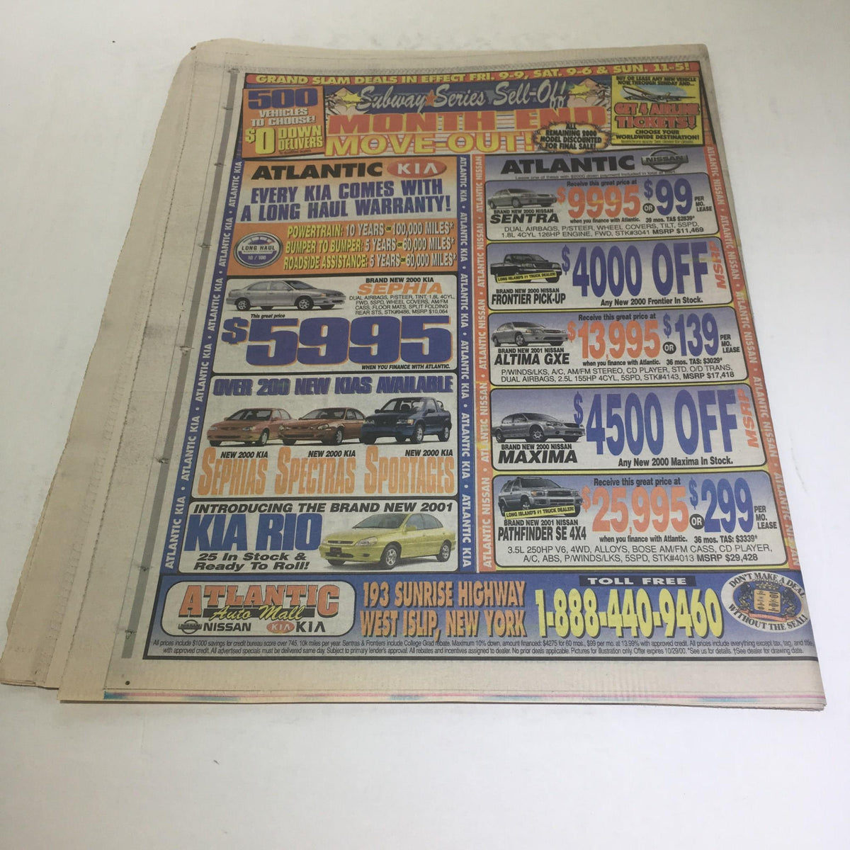 Back page advertisement from the Newsday newspaper dated October 27, 2000, promoting Atlantic Kia vehicle deals.