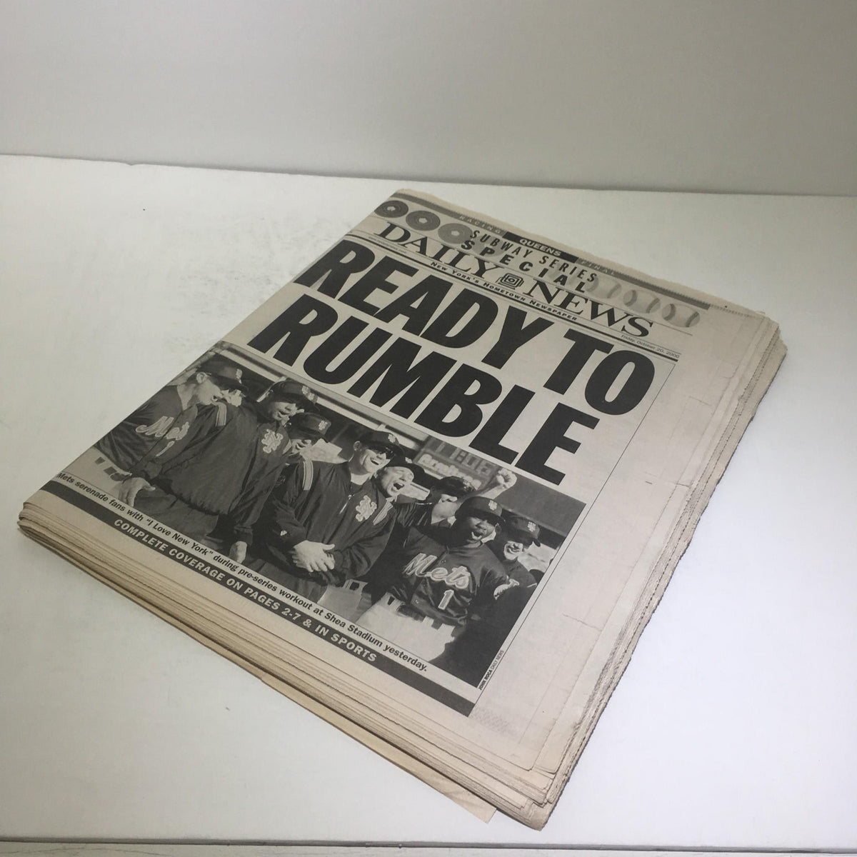 Front view of the 'NY Daily News: Oct 27 2000 Ready To Rumble' newspaper, prominently displaying the title and featuring images related to the story.