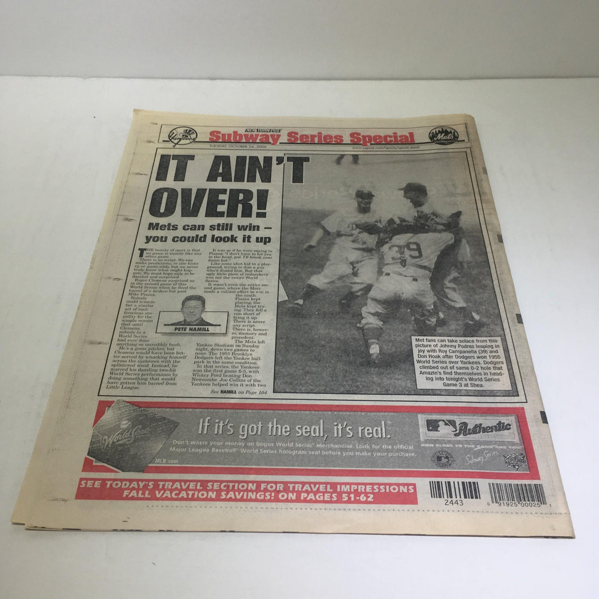 New York Post newspaper, dated Oct 24 2000, featuring the headline 'IT AIN'T OVER!' with images of Mets players celebrating their game. Condition: Excellent.