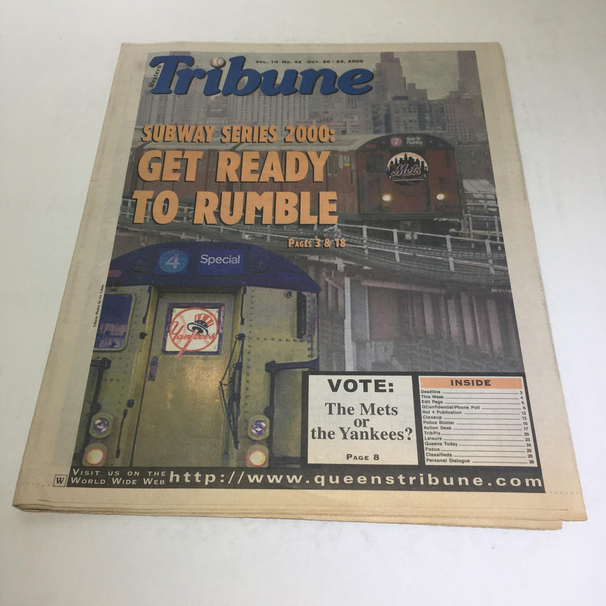 Western Tribune: Oct 26 2000 Subway Series 2000 Get Ready To Rumble newspaper cover featuring colorful subway trains and a vote on Mets vs Yankees.