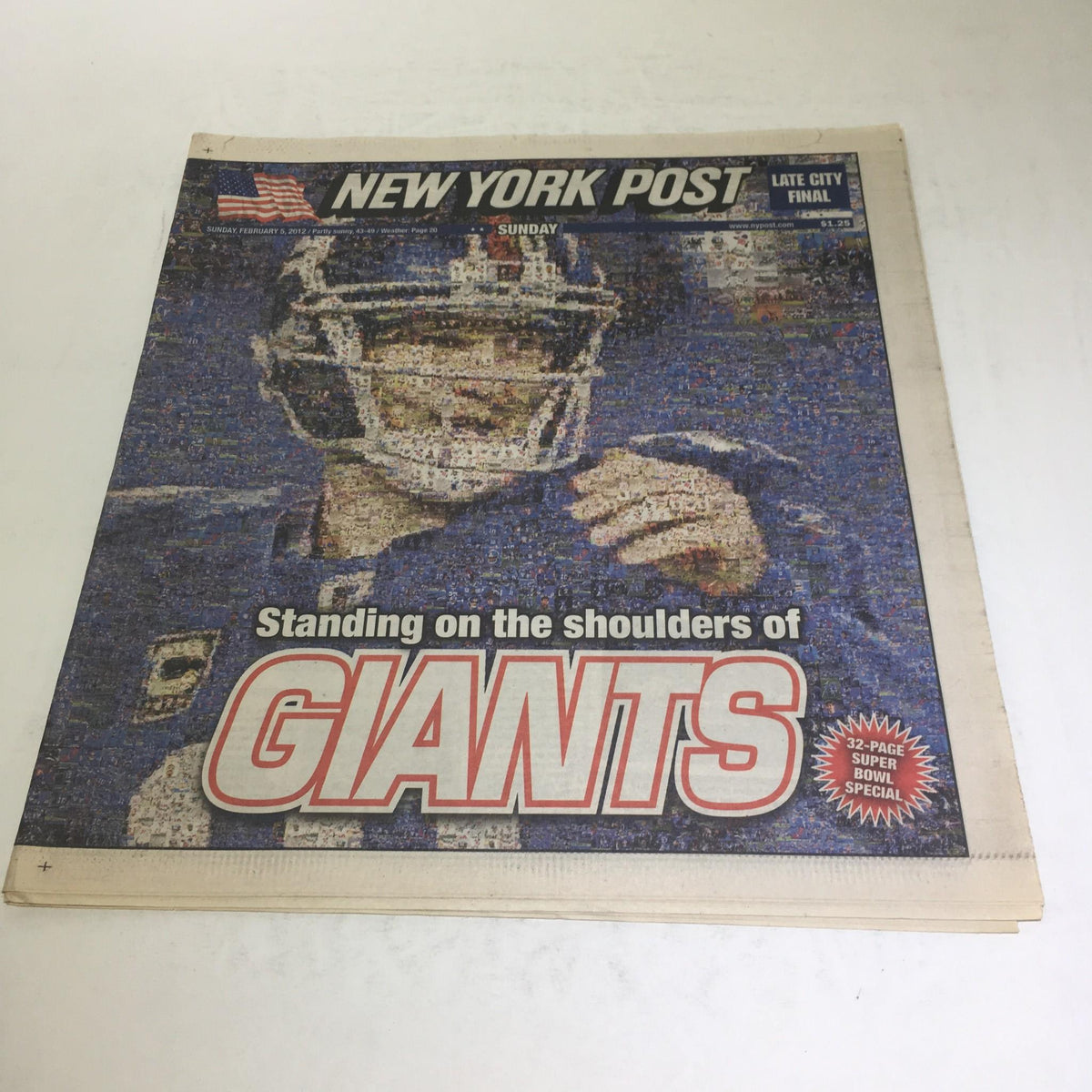 New York Post from February 5, 2012, featuring the title 'Standing on the Shoulders of Giants' with a prominent image of a football player. This nostalgic newspaper is in excellent condition, showcasing Super Bowl coverage.