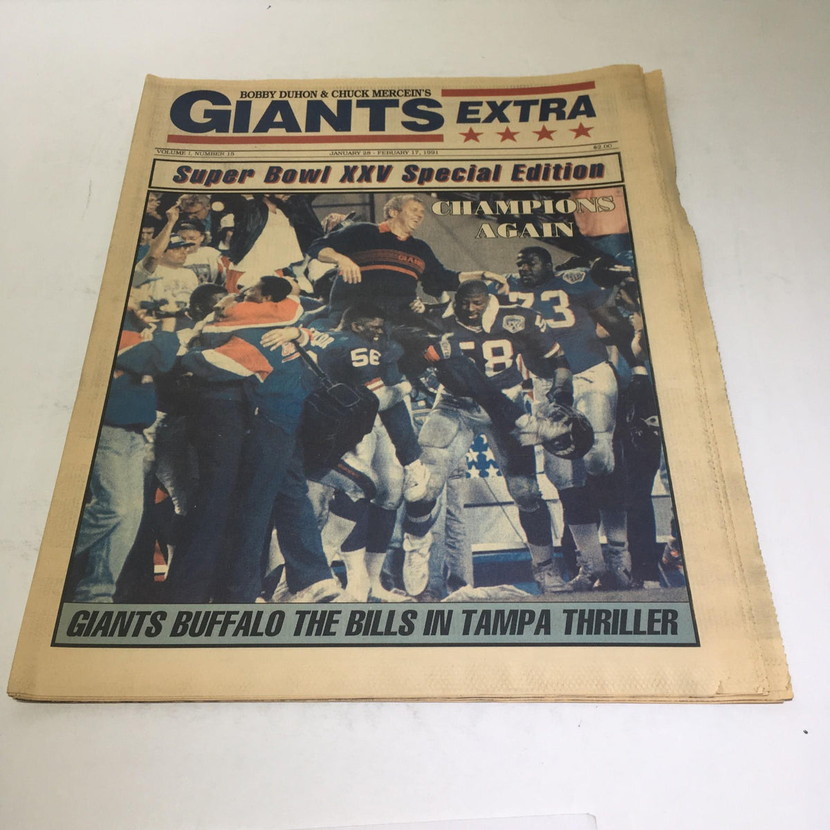 Giants Extra: Feb 17 1991 Champion Again - Cover of the Super Bowl XXV Special Edition featuring celebrating New York Giants players and fans after their victory over the Buffalo Bills.