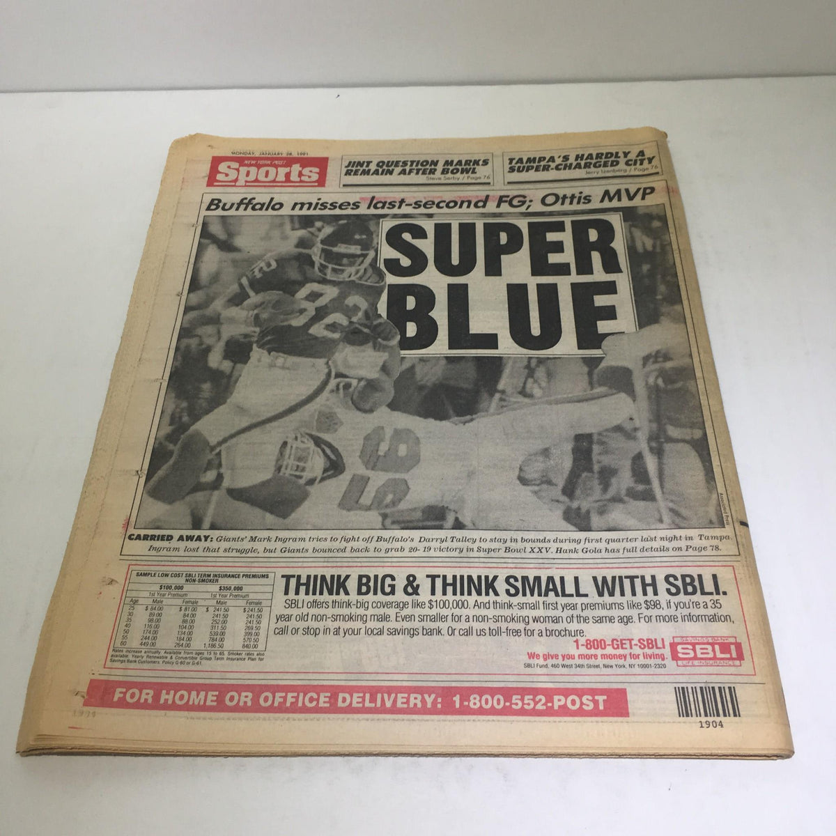 Another edition of the New York Post from January 28, 1991, showcasing the headline 'SUPER BLUE' related to the Giants' thrilling football victory.