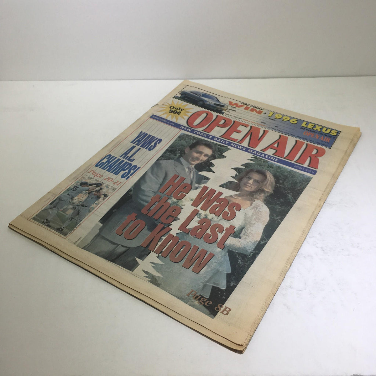 Alternate view of the NY Daily News cover from October 14, 1996, displaying the headline 'He Was the Last to Know' featuring a prominent couple.