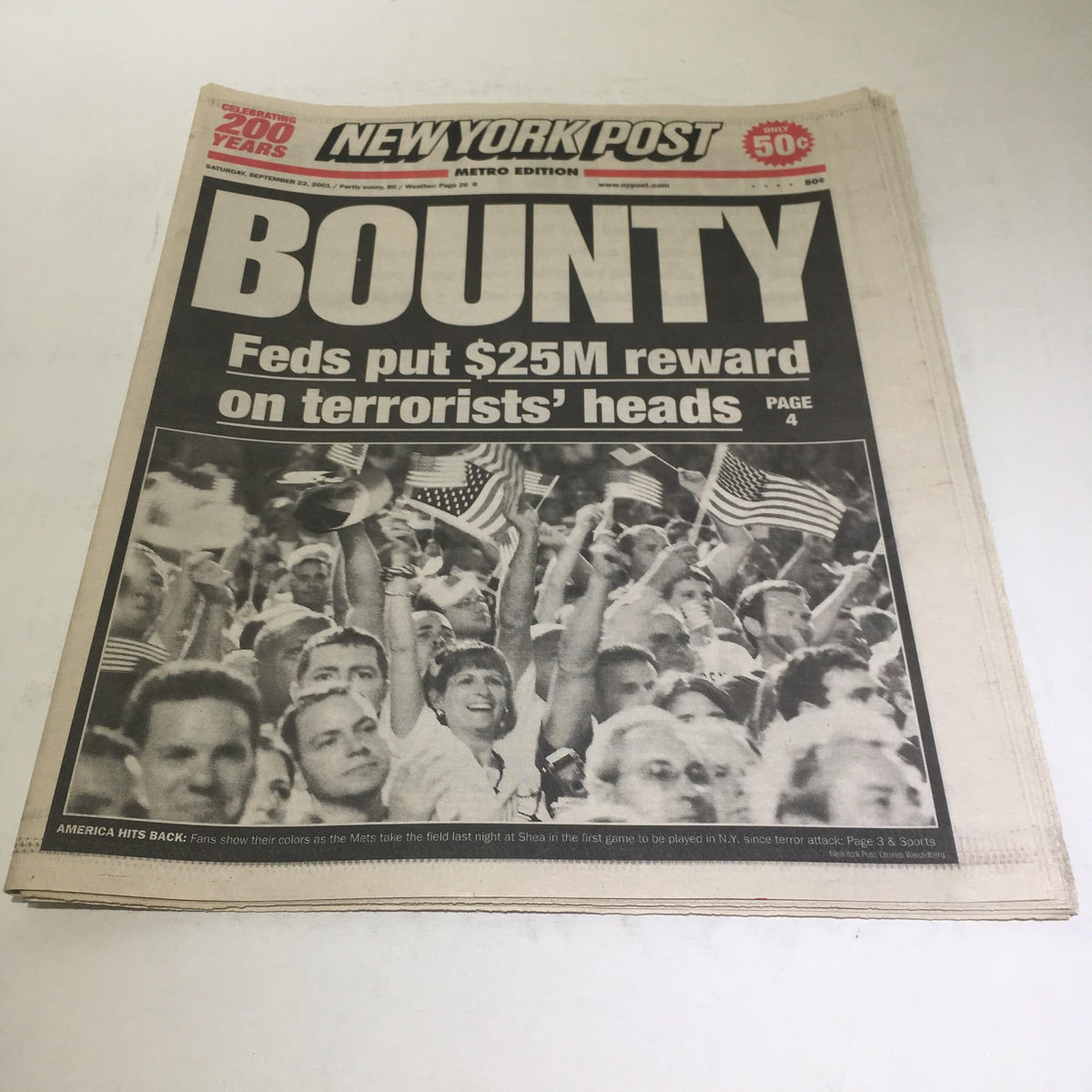New York Post headline from Sept 22, 2001: Bounty - Feds put $25M reward on terrorists' heads. Image shows crowds with American flags.