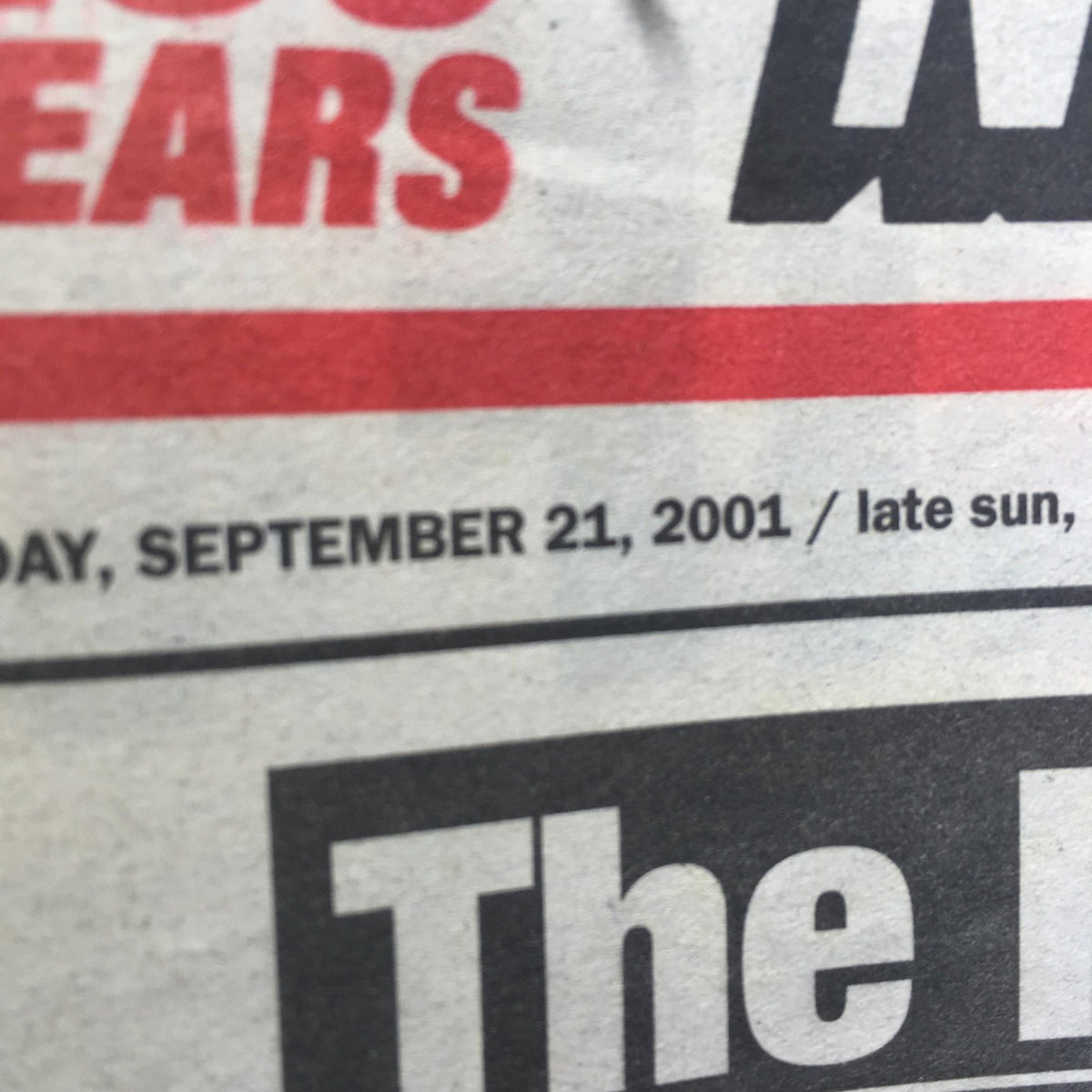 Close-up of the New York Post date, September 21, 2001, indicating it was a late evening publication reporting on significant events.
