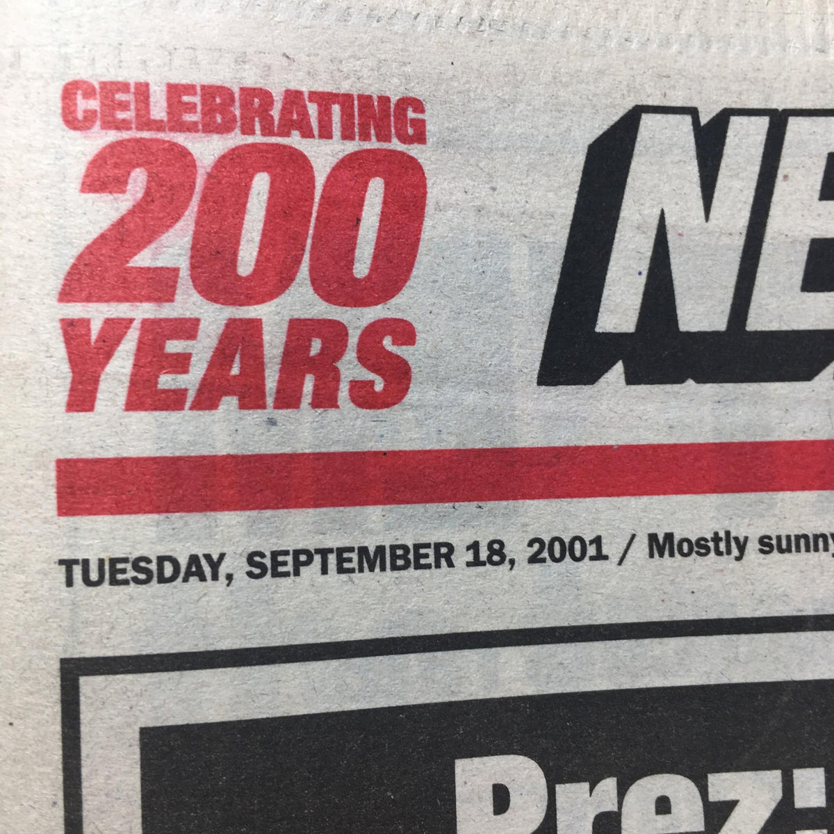 Top section of the New York Post celebrating '200 Years,' dated Tuesday, September 18, 2001, in connection with the title 'New York Post: Sept 28 2001 $590 Hit Terror Sinks The Markets.'