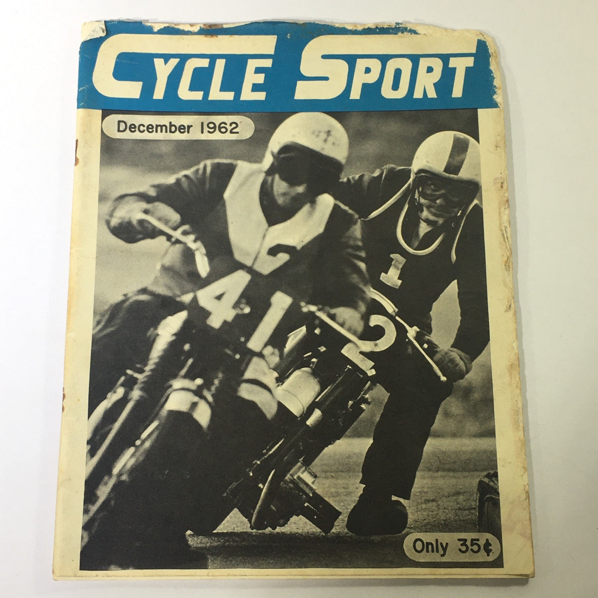 Cover of VTG Cycle Sport Magazine December 1962 featuring motorcycle racers, highlighting the 1963 Triumph Line with six new models.
