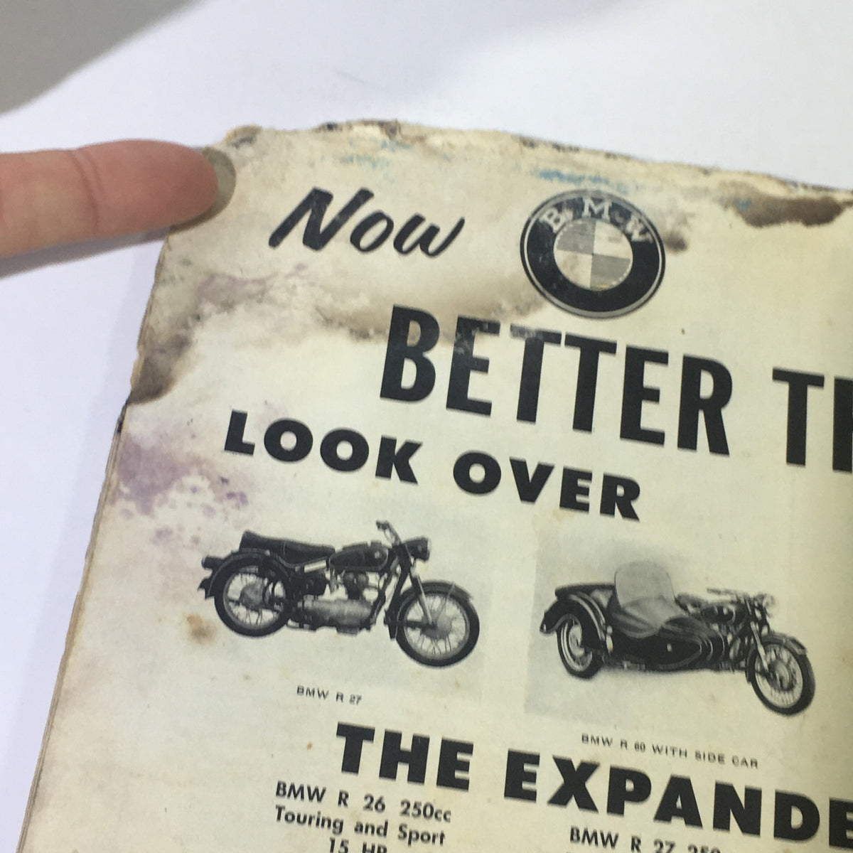 Close-up of an advertisement from the VTG Cycle Sport Magazine June 1961 featuring BMW motorcycle models and their specifications.
