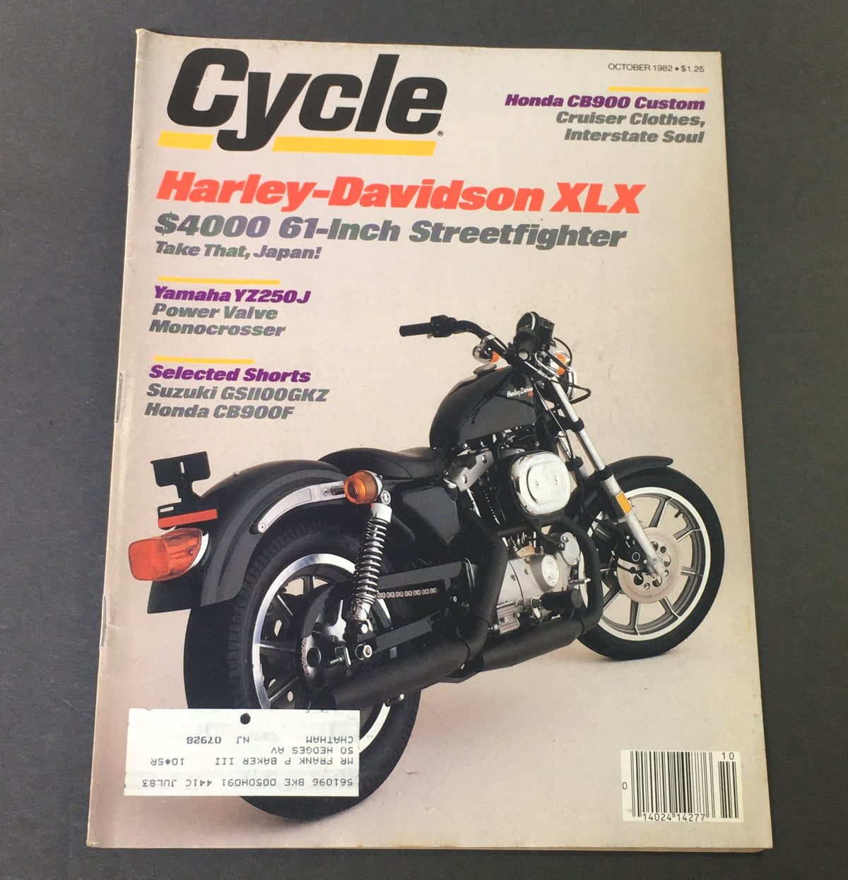 October 1982 Cycle Magazine featuring the Harley-Davidson XLX and Honda CB900 Custom on the cover, presenting classic motorcycle designs and historical automotive insights.