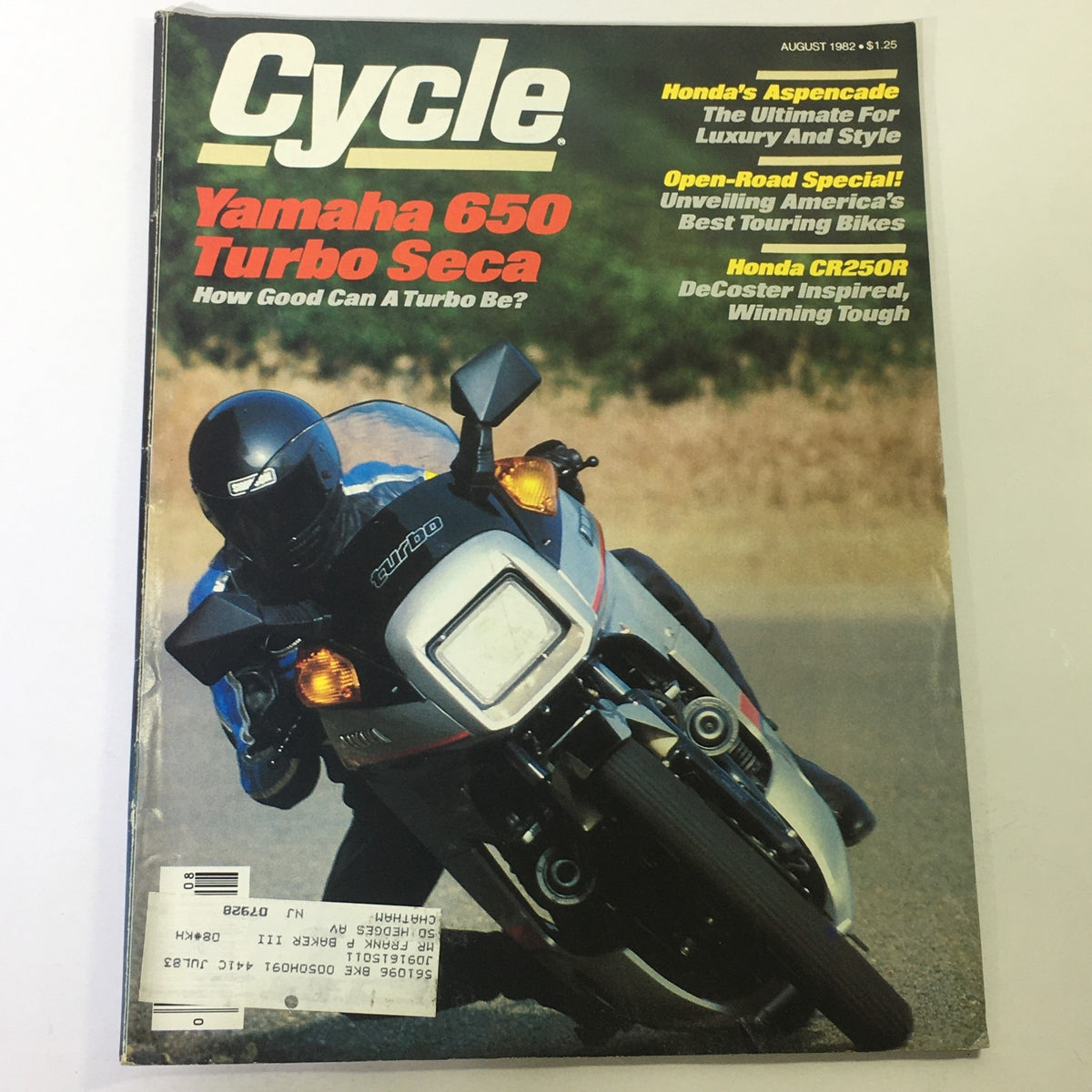 Cover of VTG Cycle Magazine August 1982 featuring the Yamaha 650 Turbo Seca and Honda CR250R with a rider in motion, highlighting classic motorcycle culture and technology.