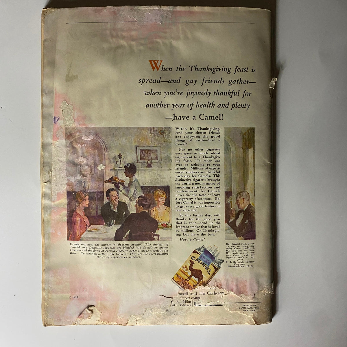 Thanksgiving-themed advertisement in The New Yorker magazine, November 6, 1926, promoting Camel cigarettes. The image features a festive gathering scene with guests around a table.