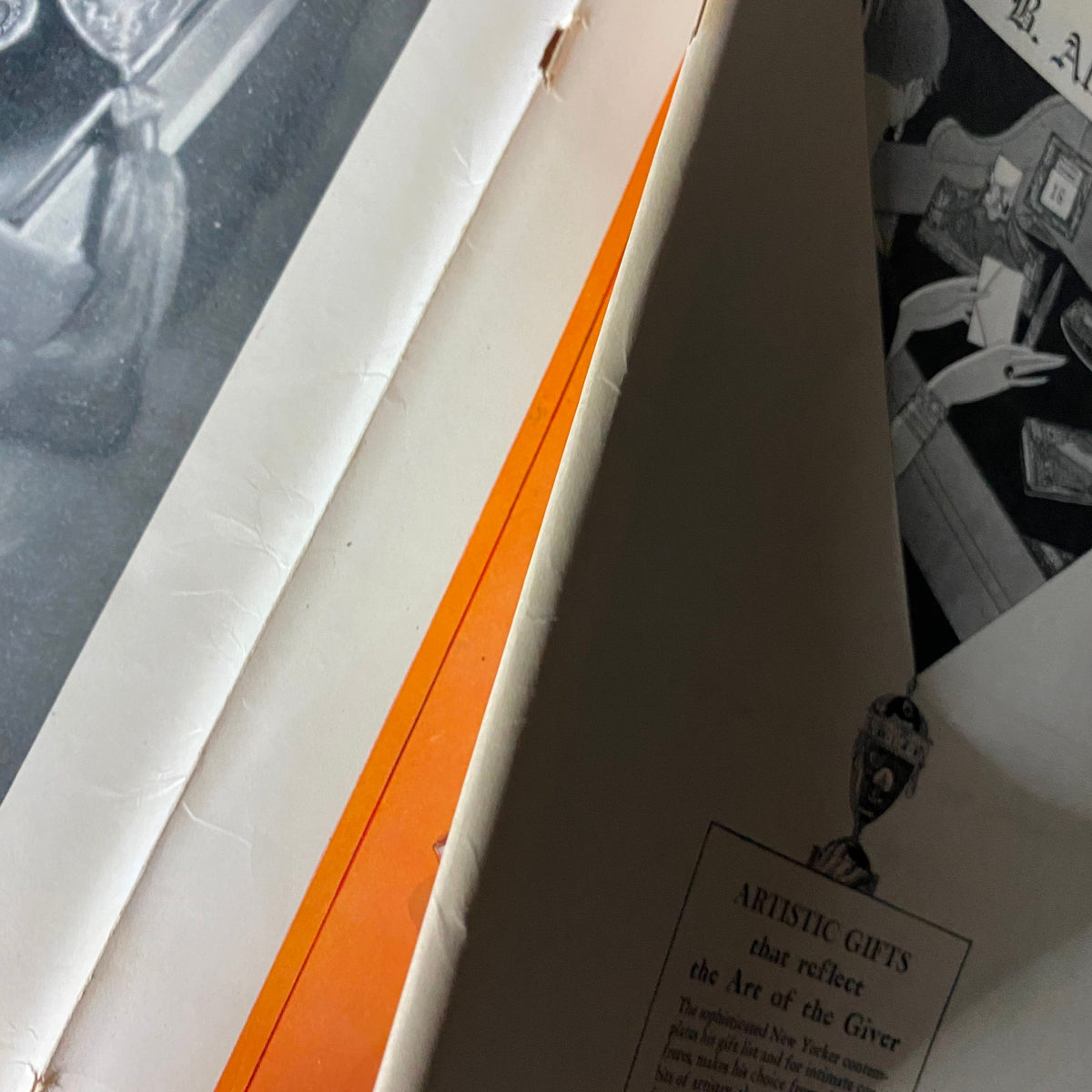 Interior view of The New Yorker Complete Magazine December 11, 1926, showcasing vibrant orange color and sophisticated design elements.