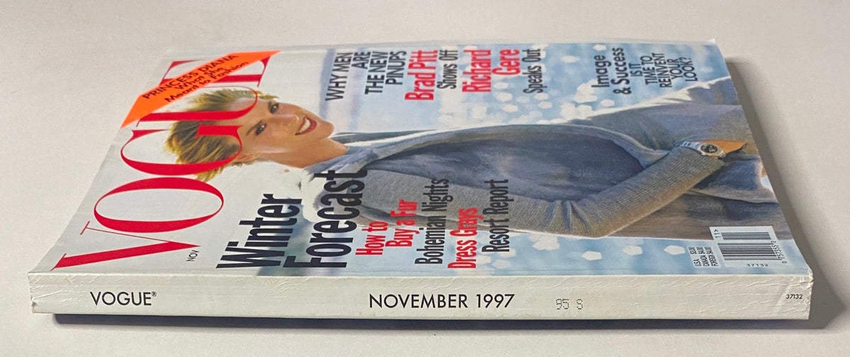 Side view of the November 1997 issue of Vogue Magazine showcasing Stella Tennant on the cover, with headlines discussing fur buying, resort fashion, and cultural features.