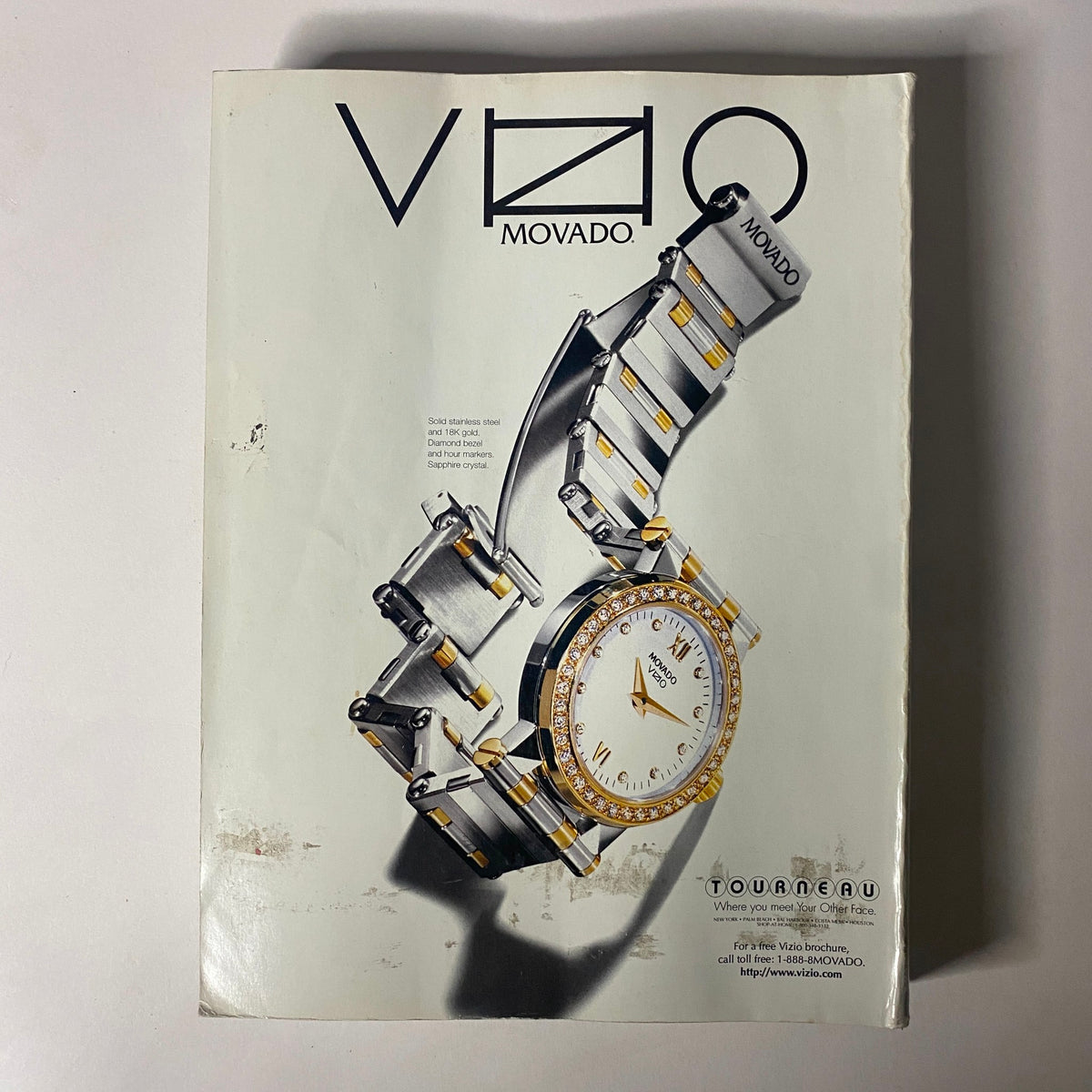 Movado watch advertisement from Vogue Magazine September 1997 showcasing a sophisticated timepiece with a two-tone design. The ad emphasizes the luxury and refined aesthetic of Movado watches.