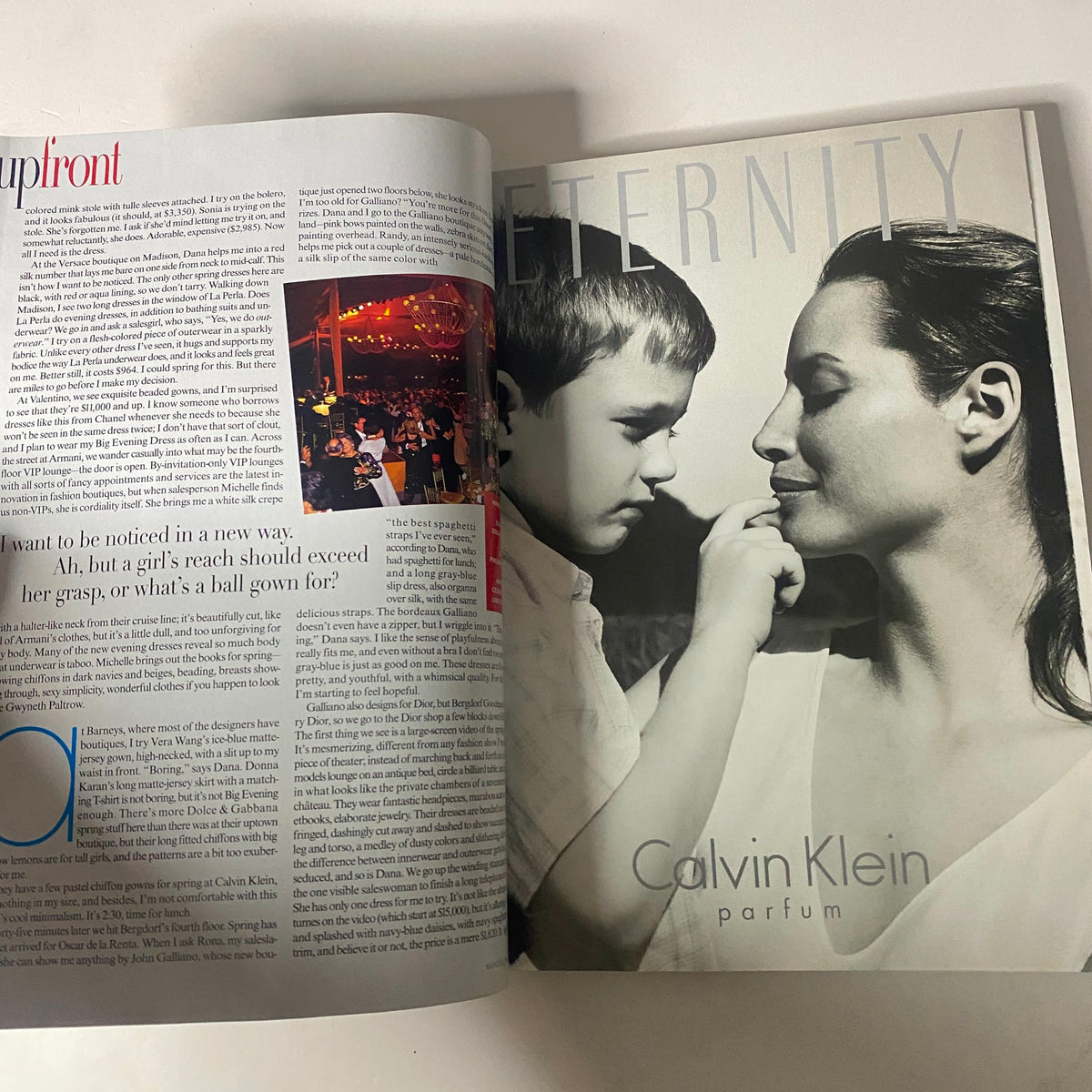 Page from Vogue Magazine March 1998 featuring an advertisement for Calvin Klein Eternity perfume with an image of a child and a woman, enhancing the theme of new beginnings.