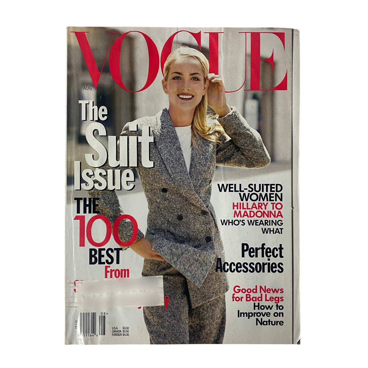 Vogue Magazine August 1997 cover featuring Georgina Grenville by Steven Meisel, showcasing a fashion-forward look with emphasis on the suit issue, highlighting style tips and iconic accessories.