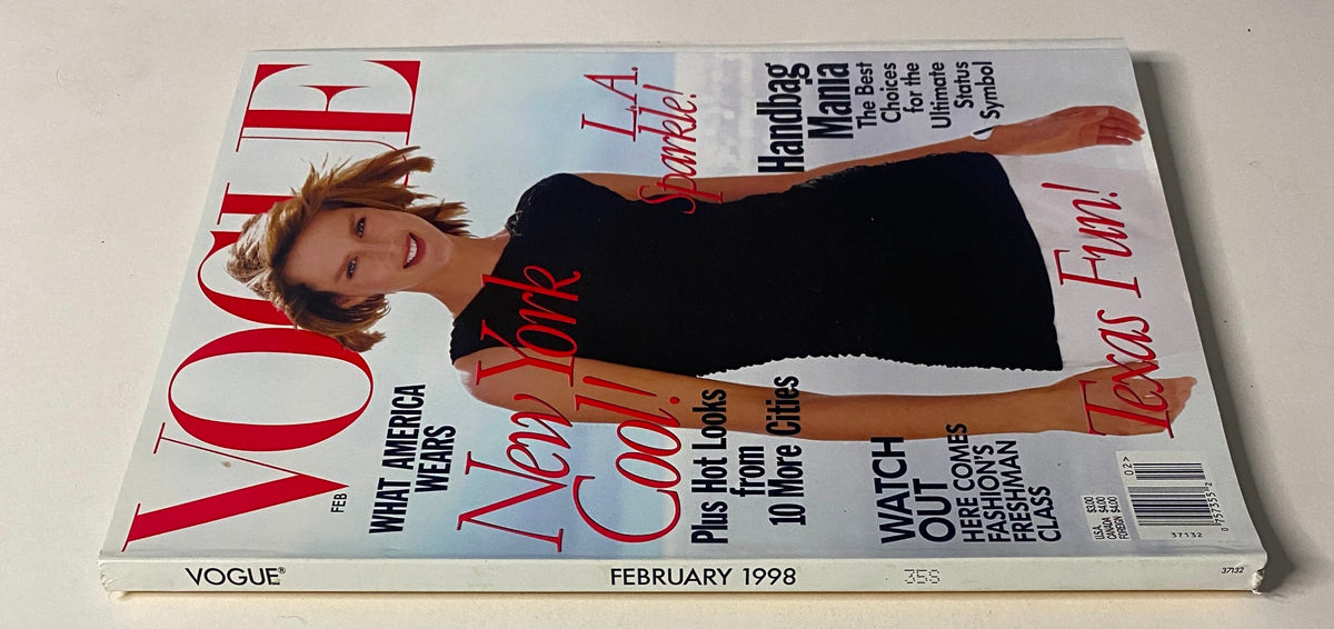 Close-up view of Vogue Magazine February 1998 with Stella Tennant on the cover, showcasing a stylish black outfit against a vibrant background.